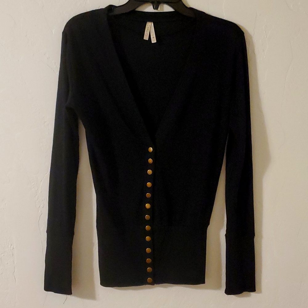 women's black sweater with  brass snap buttons